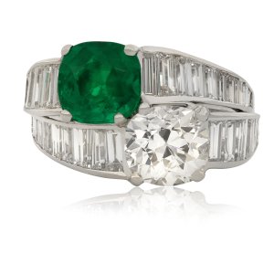 Tiffany & Co. Colombian emerald and diamond crossover ring, American, circa 1930.