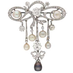 Edwardian natural pearl and diamond pendant/brooch, circa 1905. 