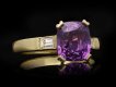 Purple sapphire and diamond flank solitaire ring, circa 1980. Hatton Garden