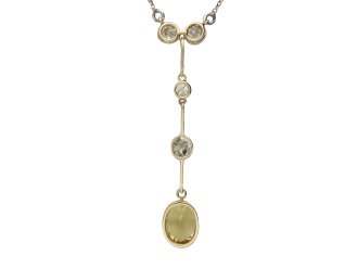 yellow ceylon sapphire and diamond pendant. hatton garden