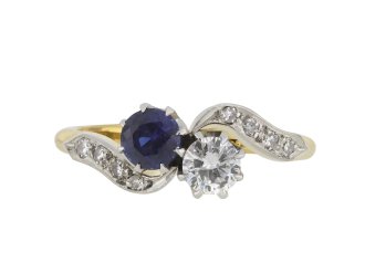 Sapphire and diamond crossover ring, circa 1940.