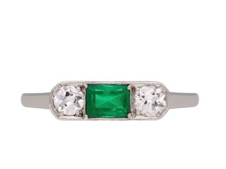 Colombian emerald and diamond three stone ring, circa 1920. Hatton Garden