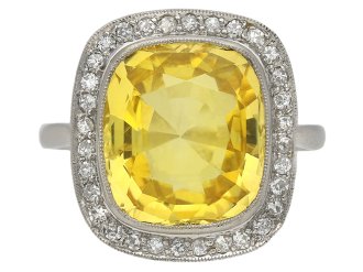 Yellow Ceylon sapphire and diamond coronet cluster ring, circa 1920. 