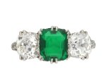 Colombian emerald and diamond three stone ring, circa 1910. 